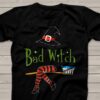Women’s Halloween witch graphic tee with spooky bad witch design.